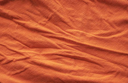 Orange Fabric cloth texture for background, old cotton fabricの写真素材