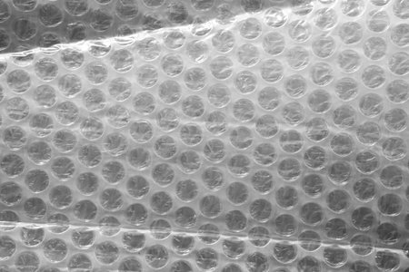 plastic cellophane texture useful as a background - black and white