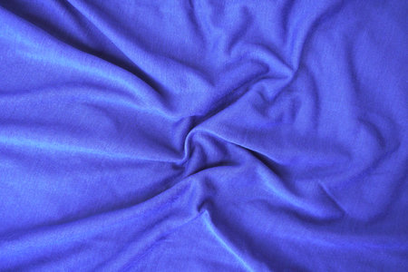 Blue satin texture background. Close up of blue satin fabric textureの写真素材