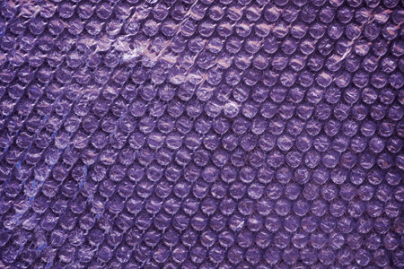 Purple plastic texture background. Close up of purple plastic texture.の写真素材