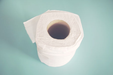 toilet paper roll on a blue background,vintage color toneの写真素材
