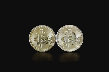 Bitcoin coins on black background. Cryptocurrency concept. Digital currency.の写真素材