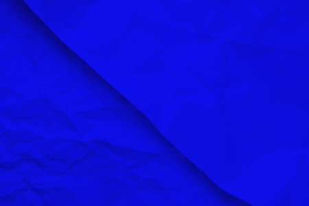 Blue creased crumpled paper background grunge texture backdrop.の写真素材