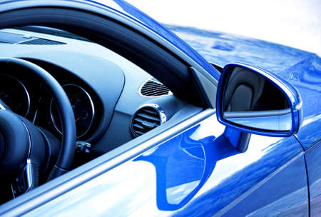 Mirror and dashboard on blue sports carの写真素材