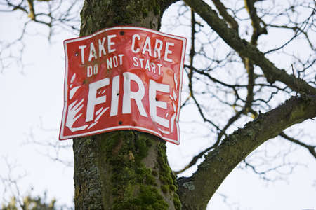 Take care do not start fire warning signの写真素材
