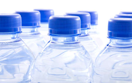 High key translucent bottled water in plastic containersの写真素材
