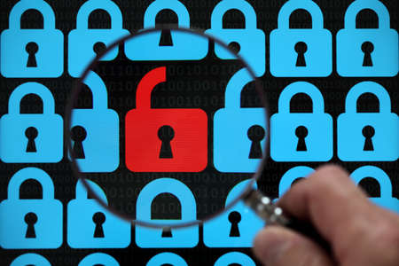 Internet security concept open red padlock virus or threat of hackingの写真素材