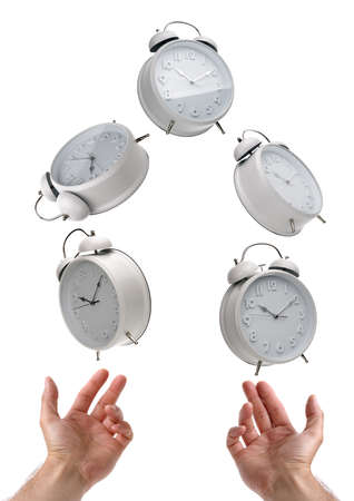Juggling time and a busy life scheduleの写真素材