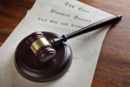 Gavel and legal papers last will and testament, divorce decree and tax law concept for the judicial system の写真素材