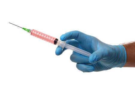 Doctor holding medical injection syringeの写真素材