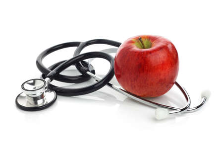 Stethoscope with apple concept for diet, healthcare, nutrition or medical insuranceの写真素材