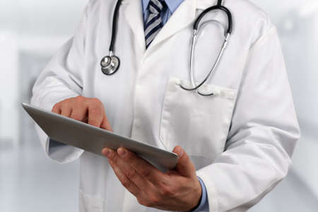 Doctor in hospital using a digital tabletの写真素材
