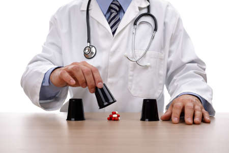 Medical gambling and risk concept for chance, choice, healthcare insurance or postcode lottery in the UKの写真素材