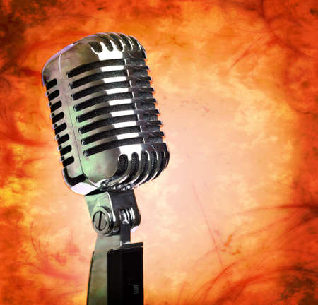 Vintage microphone on distressed grunge backgroundの写真素材