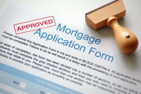 Approved Mortgage loan application with rubber stampの写真素材