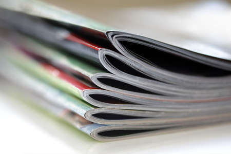 Magazines with selective focus on foreground edgeの写真素材