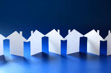 Paper chain neighborhood, row of cut out housesの写真素材