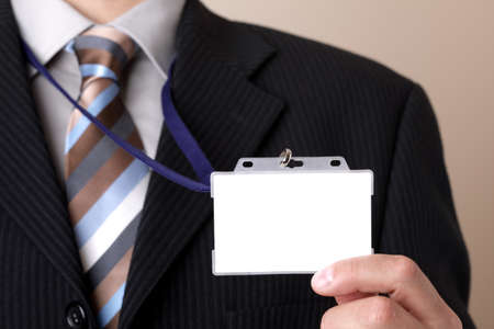 Businessman showing a blank identity name cardの写真素材