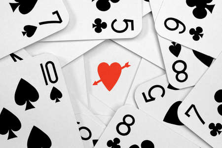 Arrow through the heart gambling concept for being lucky in loveの写真素材