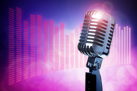 Retro microphone with stage lighting backgroundの写真素材