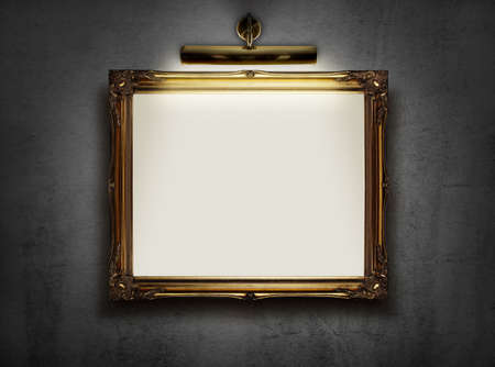 Picture frame with blank canvas hanging on a wall in an art museumの写真素材