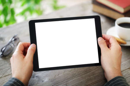 Digital tablet with blank screen in coffee shop cafeの写真素材