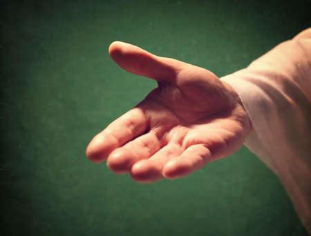 Gods hand reaching out, religion, salvation, forgiveness, assistance and love conceptの写真素材