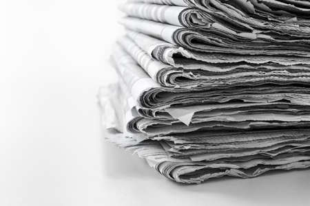 Newspapers folded and stacked concept for global communications and the mediaの写真素材