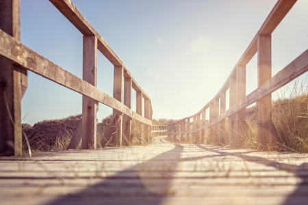 Boardwalk to the beach over sand dunes