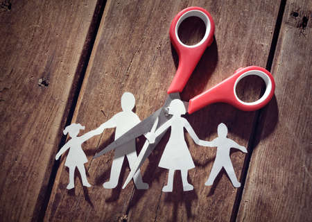 Divorce and child custody scissors cutting family apartの写真素材