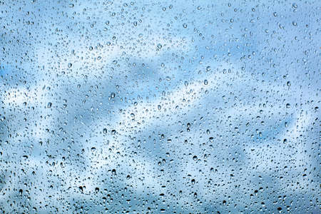 Rain water drops on glassの写真素材