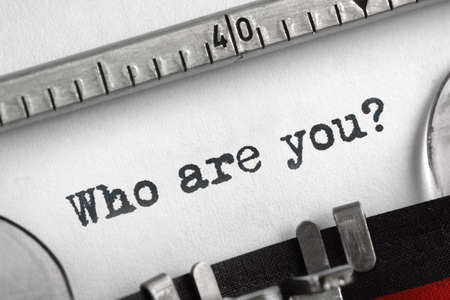 Who are you typed on an old typewriter concept for self belief, positive attitude and  identityの写真素材