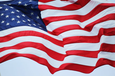 An American flag flowing in the wind.
