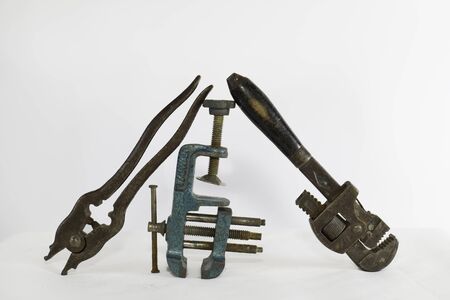 Old tools on white backgroundの写真素材