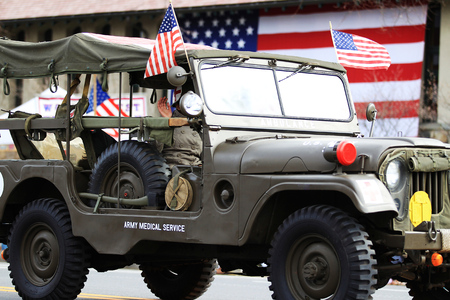 An army medical service car in a parade.のeditorial素材