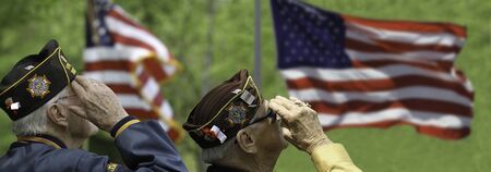 Veterans Saluting at Memorial Day Ceremony May 22, in Lexington, Massachusetts, USAのeditorial素材