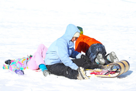 Families went snow sledding at McClennen Park, Arlington, Massachusetts, US on Jan 30, 2022 after the historical snowstormのeditorial素材