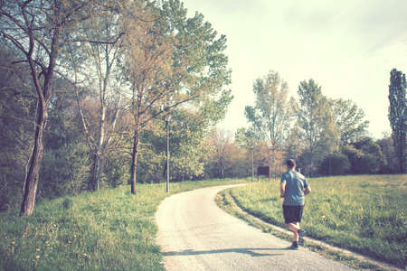 Single man running, picture vintage effectの写真素材
