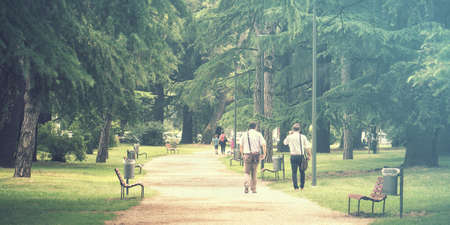 Horizontal image of walking businessmen, soft vintage effect pictureの写真素材