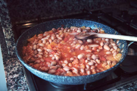 cooking chili beans in the pan, food cooked with a non stick toolの写真素材
