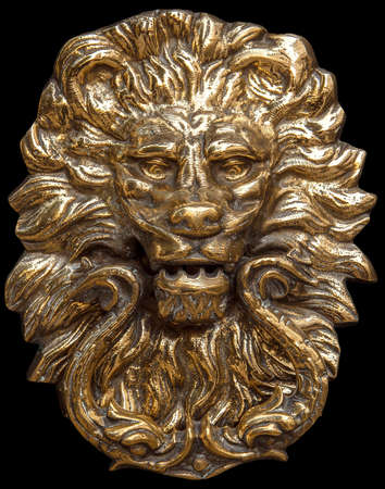 golden lion on black background, vintage object symbol of powerの写真素材