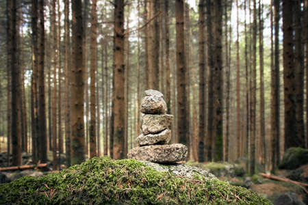 stones in equilibrium, pile of rocks in the woodsの写真素材