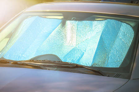 Sunshade on the windshield. Protection from the heat of the sunの写真素材