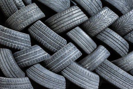 used car tires, the curved lines of rubbers create a visual dynamic effect