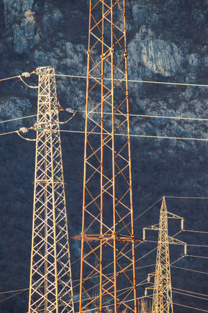 rusted electricity pylons, old power line