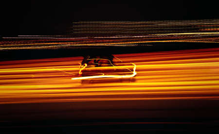 abstract fast car, vehicle is moving (power speed light effect)の写真素材