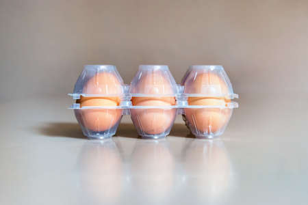 Eggs in plastic box with copy space, it is possible to insert texts and graphics around the main subjectの写真素材