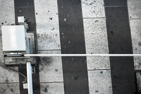 barrier on crosswalk, top view on pedestrian crossingの写真素材
