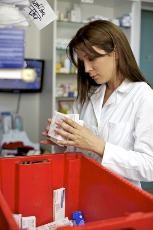 Pharmacist controlling medicineの写真素材