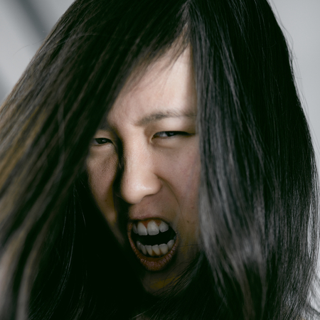 Young asian actress playing monster partの写真素材